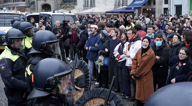 Pro-Palestinian protesters take part in a banned demonstration in Amsterdam